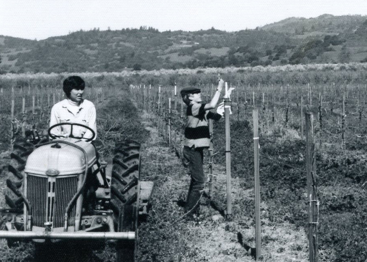 Mary and Parke install sprinklers in 1973