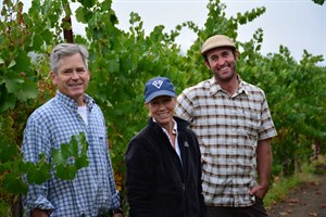 Parke and Sarah Hafner along with Vineyard Manager, David Huebel, taste the Chardonnay fruit and discuss when to the Harvest will begin.