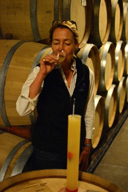 Sarah Hafner tasting the Chardonnay fermentation at Hafner Vineyard.