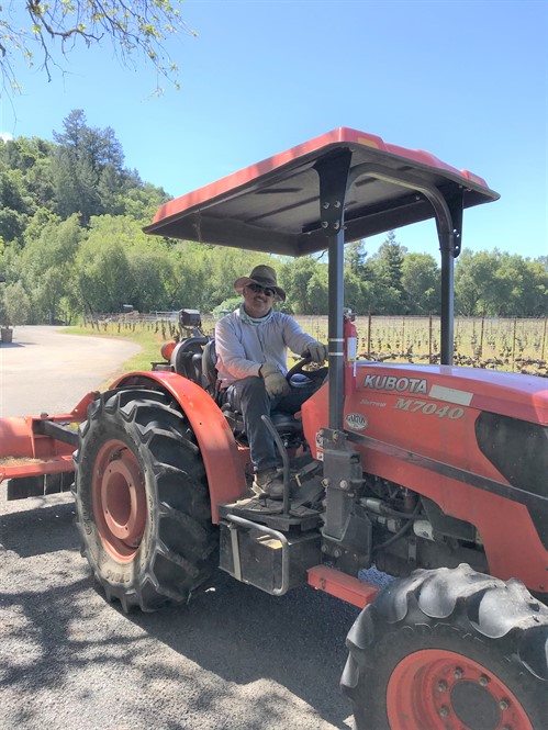 Gerardo on the Tractor